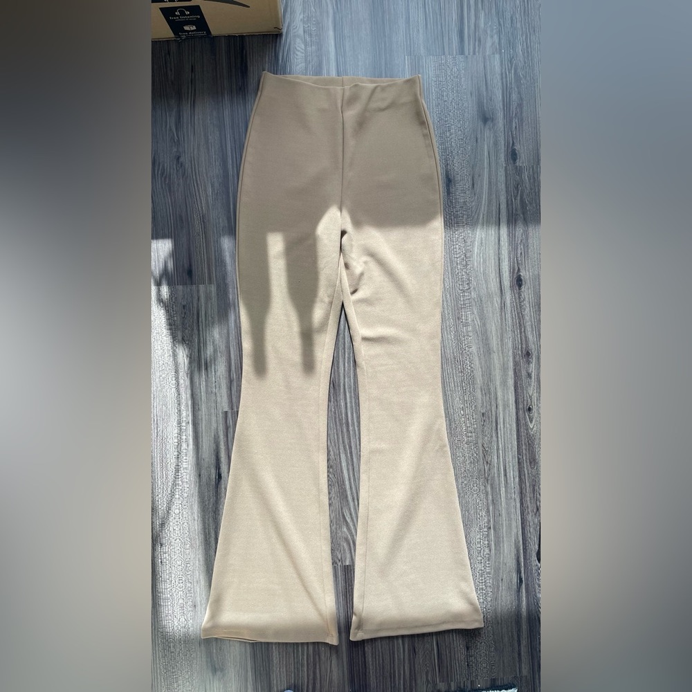 H&M tan flare trousers